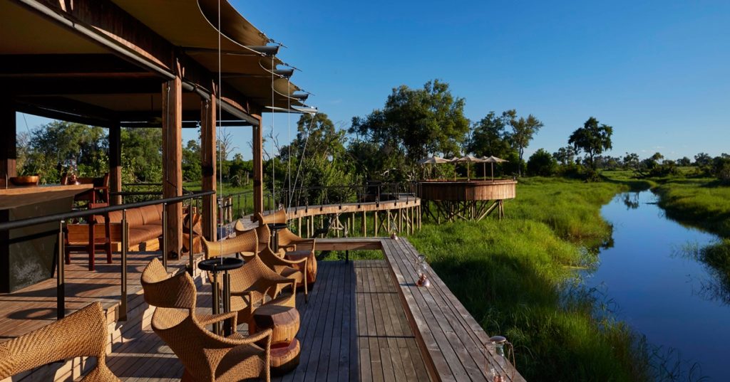 Jetty with a view of the channel and landscape beyond for a special African safari at Xigera Safari Lodge, Okavango Delta, Botswana