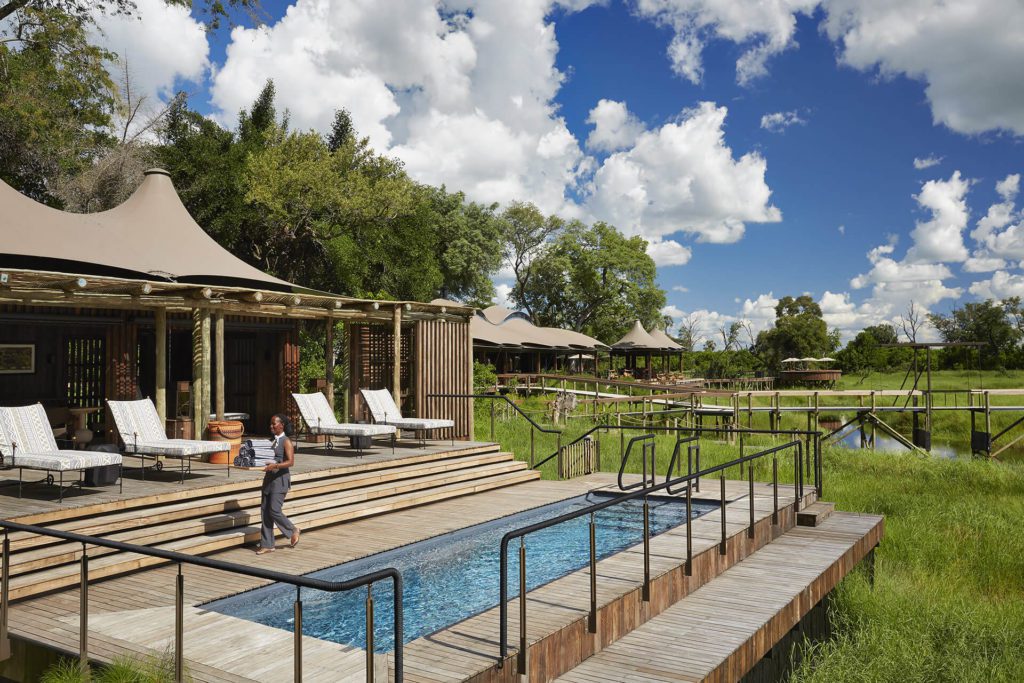 swimming pool with view of the channel below, Xigera safari Lodge, Okavango Delta, Botswana