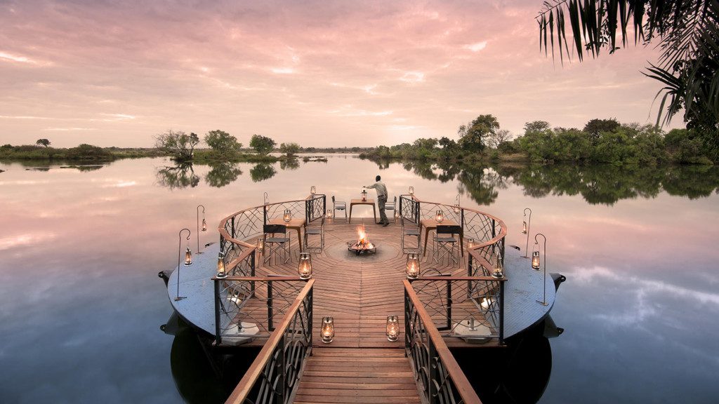 Jetty at dusk on the Zambezi River at Thorntree River Lodge in Victoria Falls