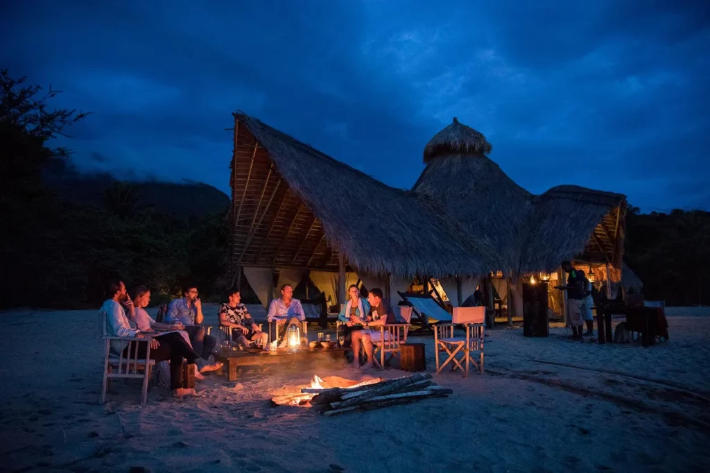 Around the campfire on the beach oin the shore of lake Tanganyika at Mahale Mountain National Park