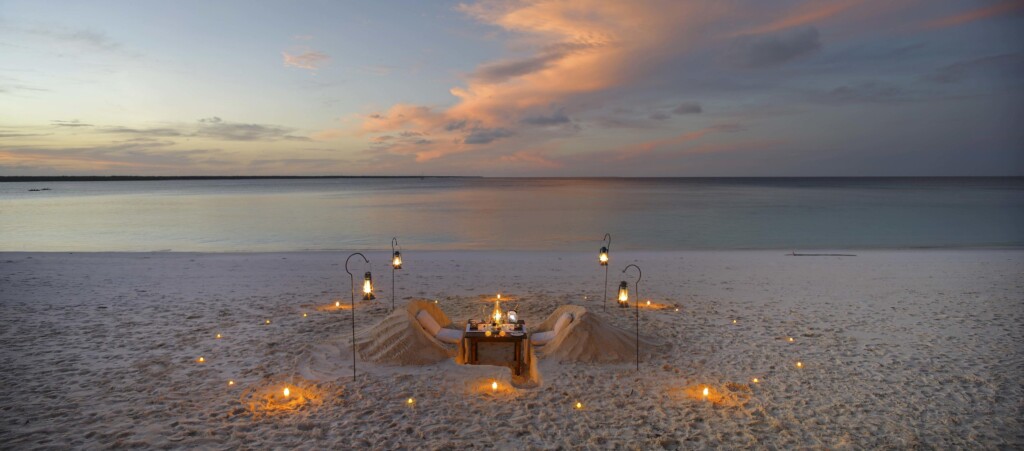 andBeyond-Mnemba-Island-Lodge-Zanzibar-Tanzania-candlelit-dinner-on-the-beach